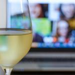 Filled,Glass,Of,Wine,In,Front,Of,A,Laptop